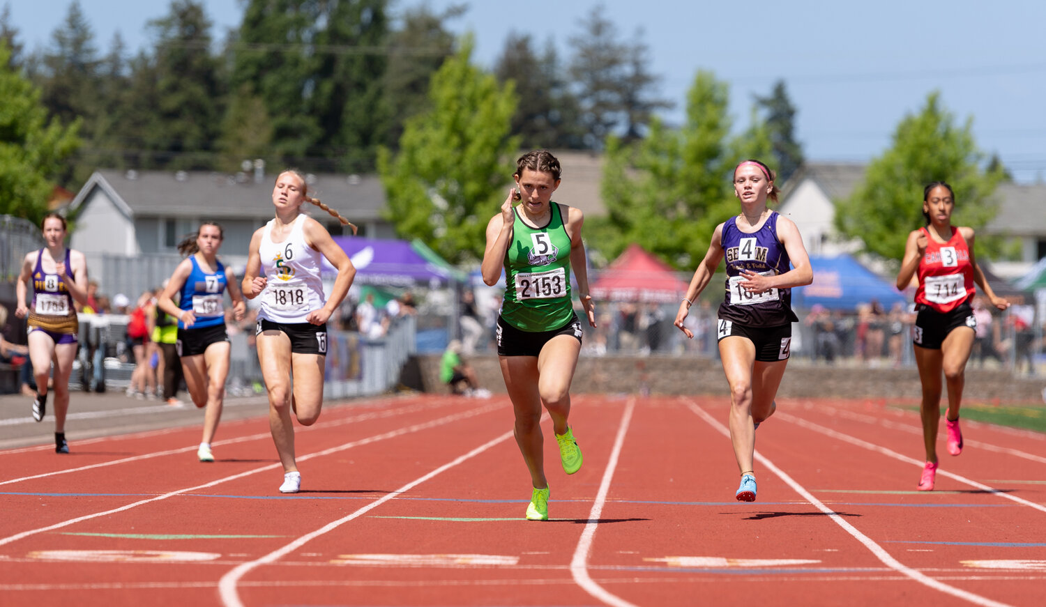 Tumwater’s Annabelle Clapp strides out the final steps in a victorious 400-meter final at the WIAA 2A/3A/4A State Track and Field Championships on Saturday, May 27, 2023, at Mount Tahoma High School in Tacoma. (Joshua Hart/For The Chronicle)